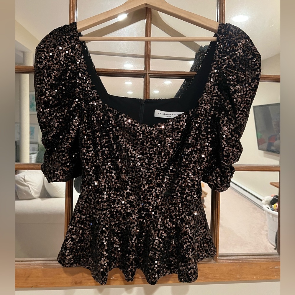 Amanda Uprichard- small. Peplum fit, gathered sleeves. Somewhat cropped.